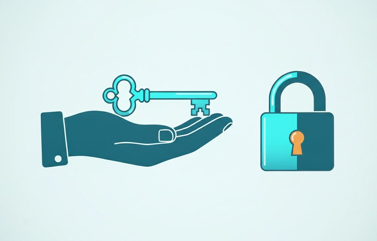 A key lying in an open palm beside a separate closed padlock