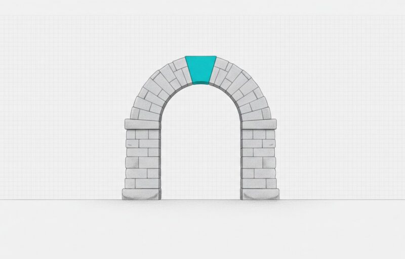 Illustration: a plain stone archway standing alone on open ground, with a single cyan keystone at its apex.